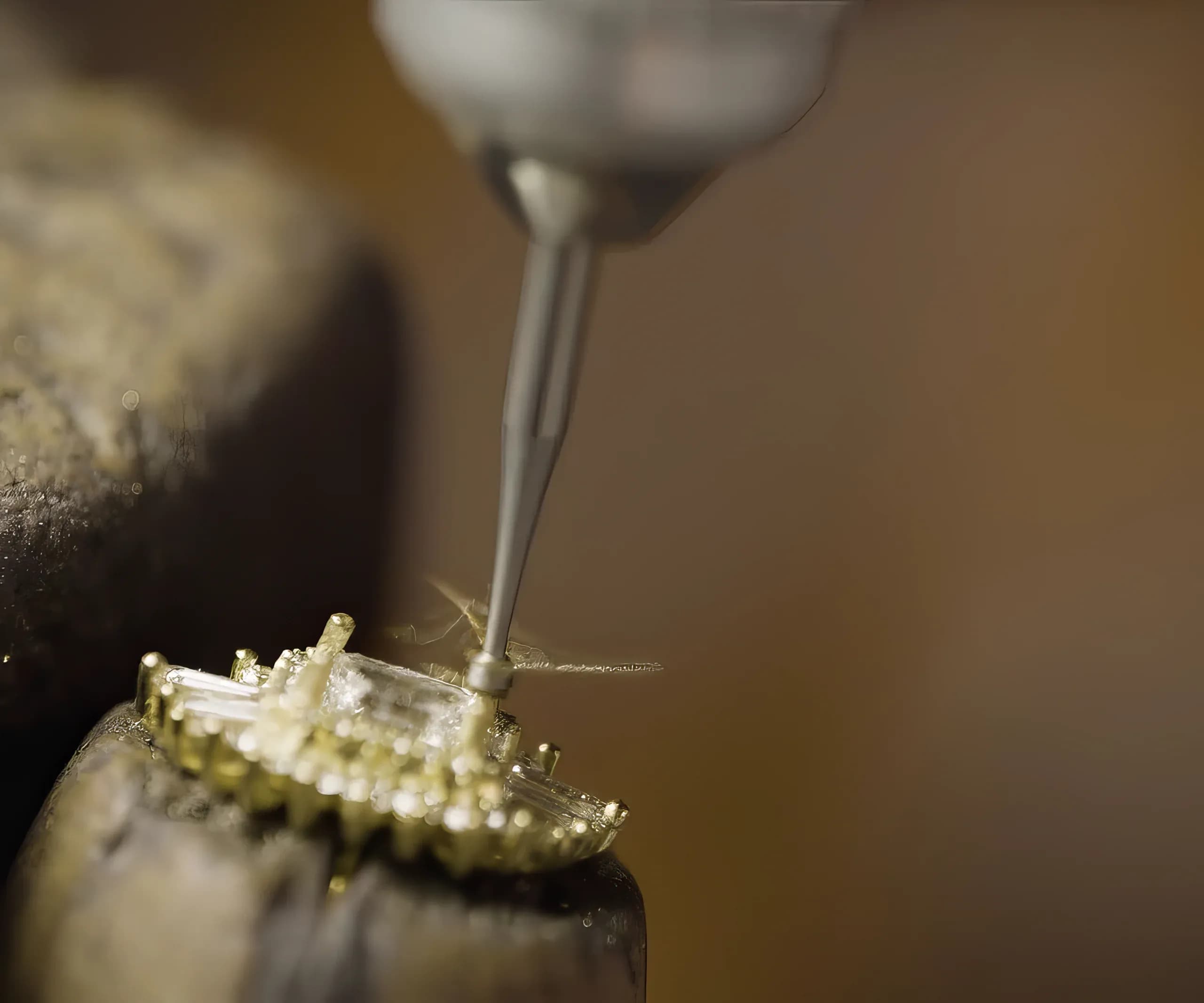 A jeweler working on a Heidi Gibson gold ring