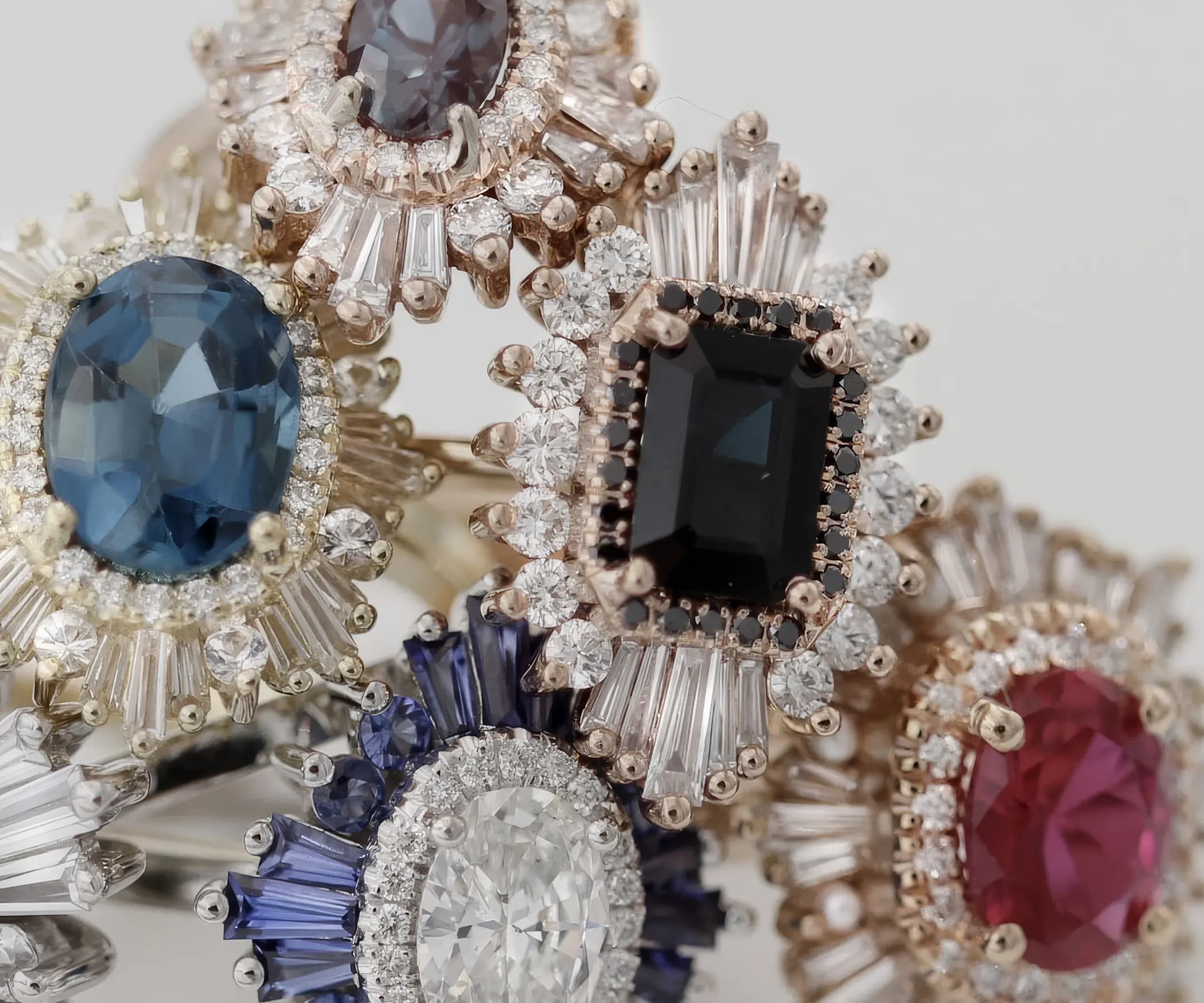 Various types of gem stones placed on Heidi Gibson rings